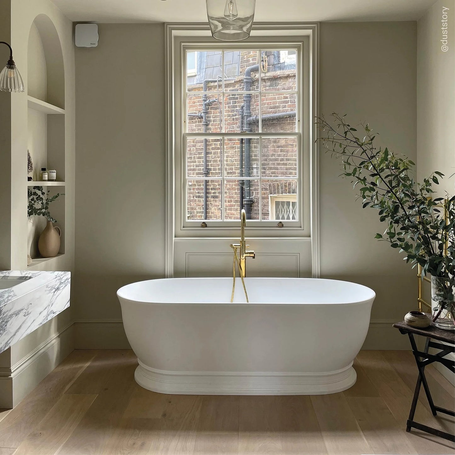 White Freestanding Stone Bath