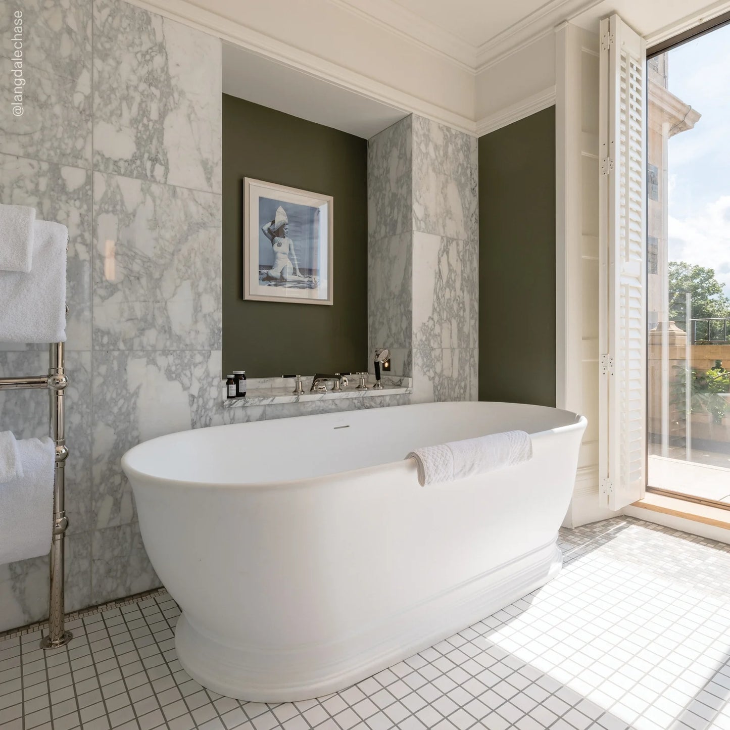 White Freestanding Stone Bath
