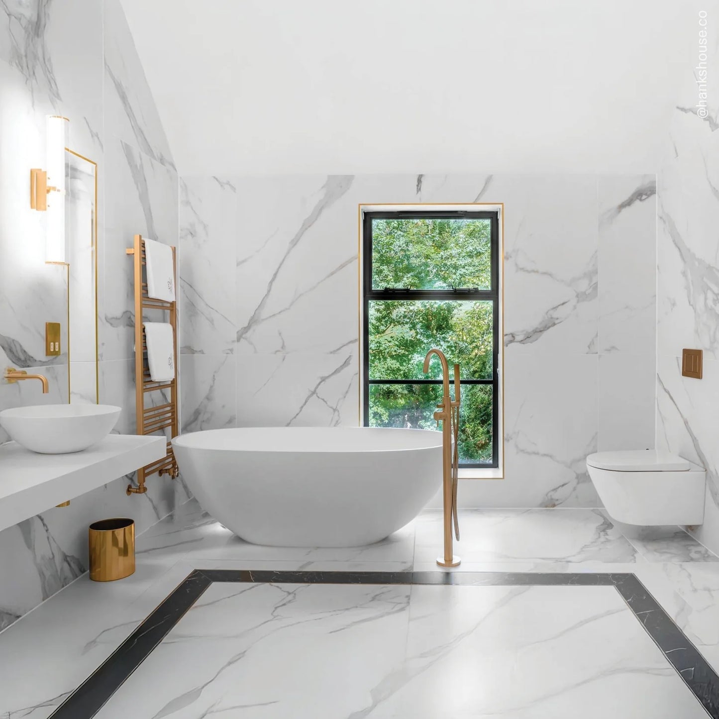 White Freestanding Stone Bath